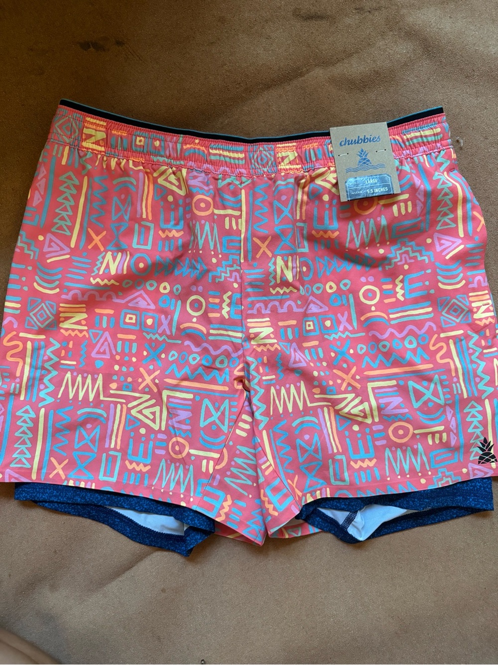 NWT chubbies Coral Swim Trunks with Multicolor Geometric Print